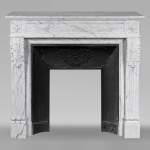 Louis XVI style mantel with Cupid attributes carved in Arabescato marble