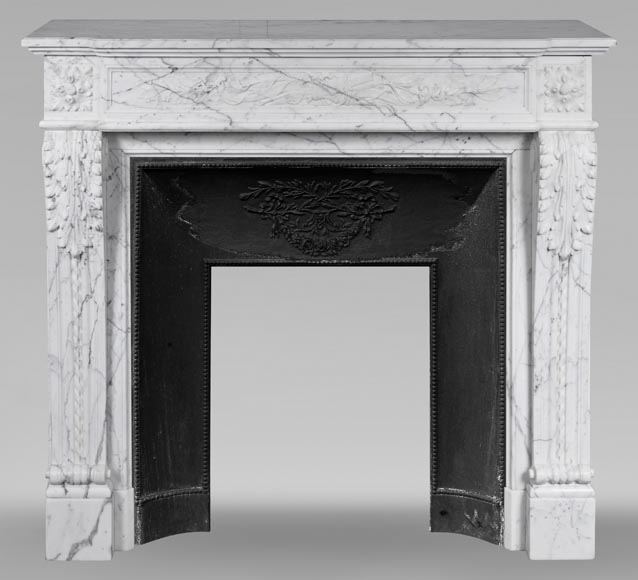 Louis XVI style mantel with Cupid attributes carved in Arabescato