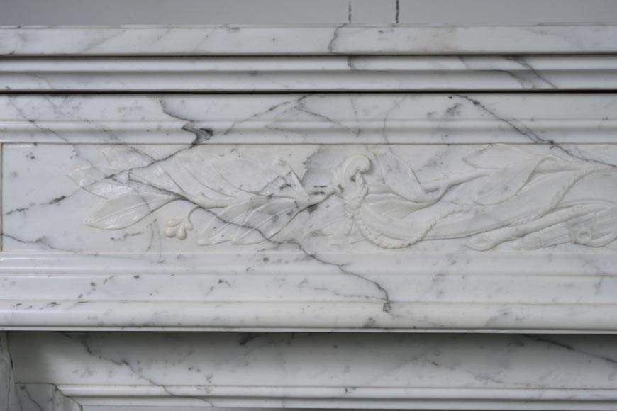 Louis XVI style mantel with Cupid attributes carved in Arabescato