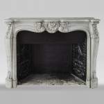 Antique Louis XV style mantel in Carrara marble with a beautiful shell