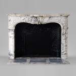 Beautiful antique Louis XV style fireplace in Serravezza marble
