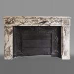 Antique Louis XVI style fireplace made out of Breche Violette marble