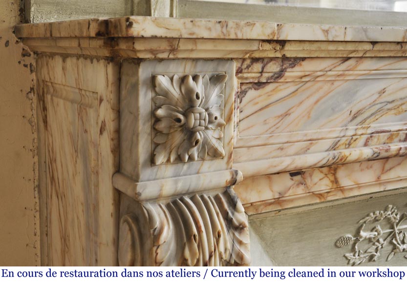 An antique Louis XVI style fireplace in Skyros marble-3