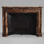 Antique Louis XIV style fireplace in Red from the North marble with its cast iron insert