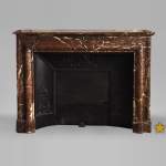 Antique Louis XIV style fireplace in Red from the North marble with its cast iron insert