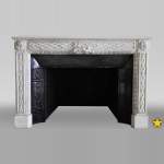 Antique Louis XVI period fireplace in Carrara marble decorated with grapevines and grapes