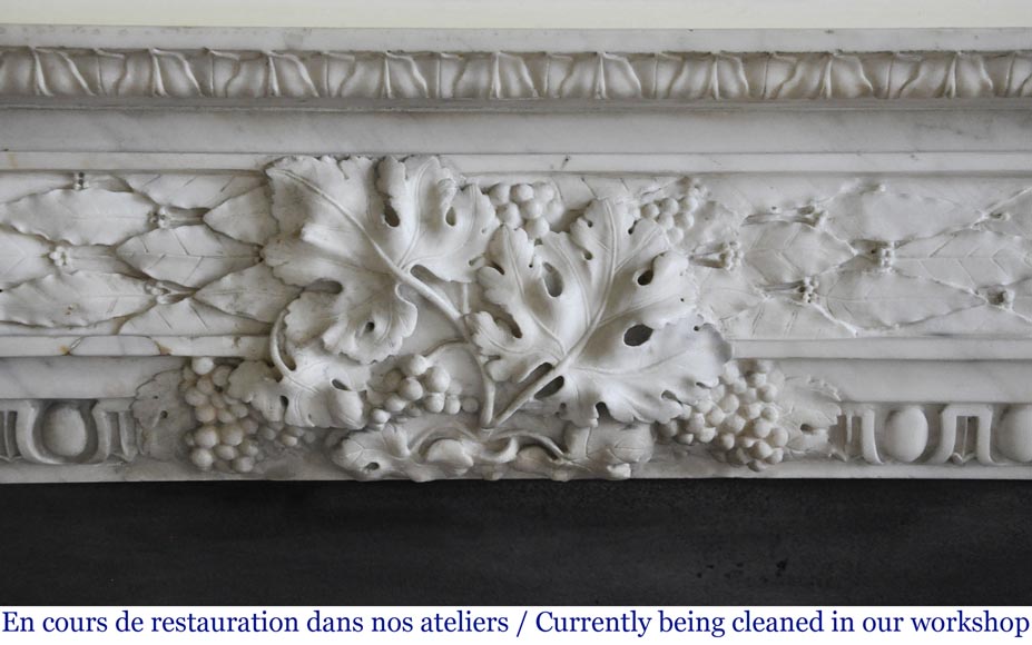 Antique Louis XVI period fireplace in Carrara marble decorated with grapevines and grapes-1
