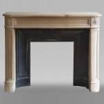 Antique Louis XVI style slightly curved stone fireplace