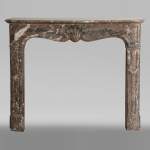 Antique Louis XV period fireplace in Rouge du Nord 