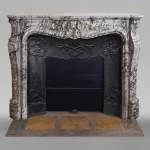 Antique Louis XV style fireplace in Bleu Fleuri marble