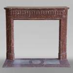 Antique Louis XVI style fireplace with rounded corners in Griotte marble from the Pyrenees