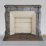 Antique Louis XV style curved Pompadour fireplace in Bleu Fleuri marble