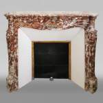 Antique Louis XV style fireplace, Pompadour in Rouge Royal marble