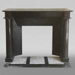 Antique Empire style fireplace with detached columns in black marble