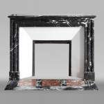 Antique Louis XIV style mantel in black Marquina marble.