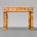 Empire style fireplace in Sienna yellow marble with columns and gilt bronze rosettes
