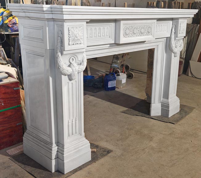 Large Louis XVI style Carrara marble fireplace, featuring fluting and garland ornamentation Large Louis XVI style Carrara marble fireplace, featuring fluting and garland ornamentation-3