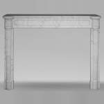 Louis XVI fireplace with half columns in a veined Carrara marble