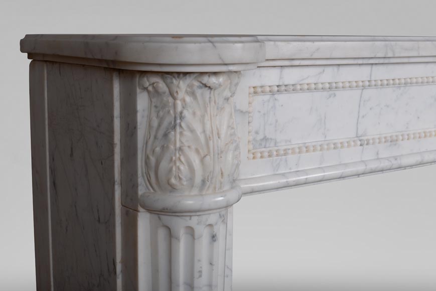 Louis XVI fireplace with half columns in a veined Carrara marble-4