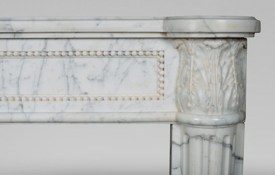 Louis XVI fireplace with half columns in a veined Carrara marble-7