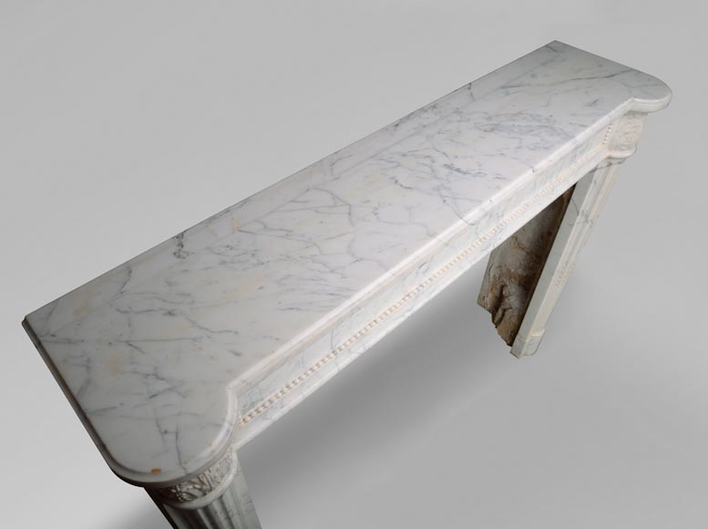 Louis XVI fireplace with half columns in a veined Carrara marble-10