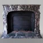 Important antique Regence style mantel in Violet Breccia marble, end of the 19th century