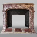 Important antique Regence style mantel in Fleur de pêcher marble