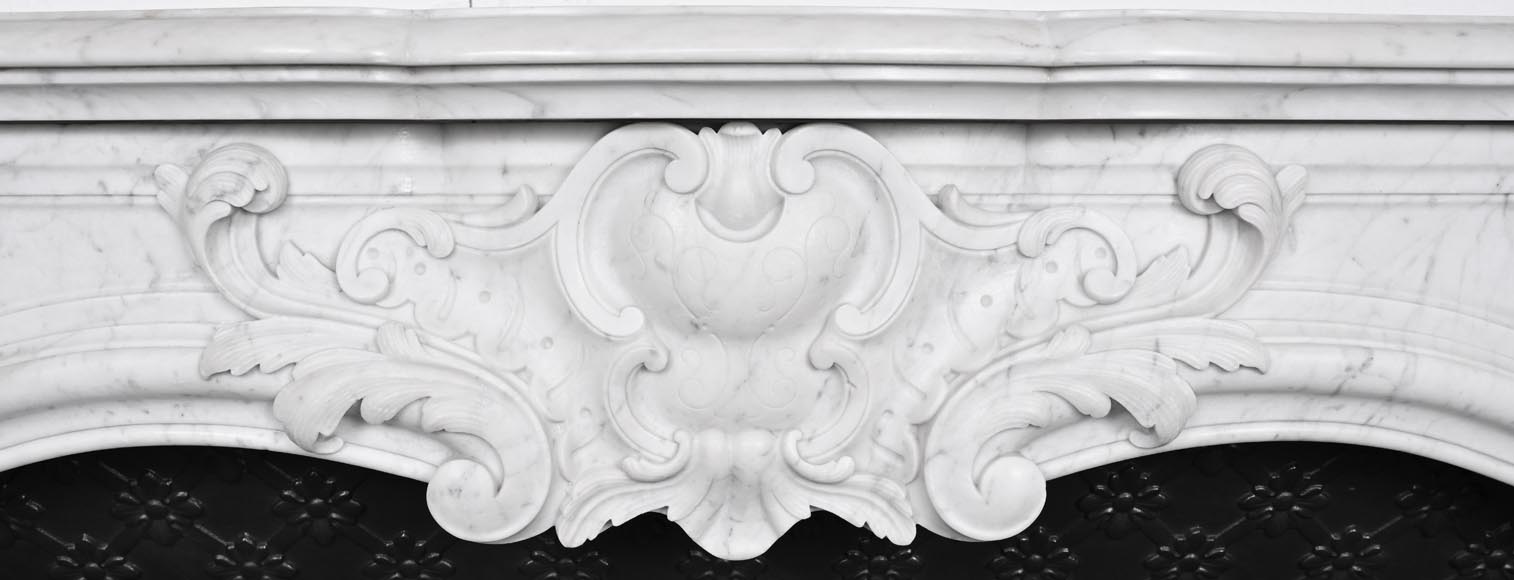 Louis XV-style Carrara marble fireplace, decorated with a palmette Louis XV-style Carrara marble fireplace, decorated with a palmette-1