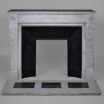 Beautiful antique Louis XVI style fireplace with flutes
