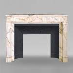 Louis XVI style fireplace in Paonazzo marble with a flowers garland
