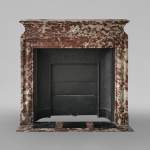 Bollection fireplace with acroterion in Red from the North marble