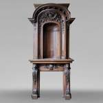 Napoleon III walnut fireplace surmounted by an important alcove
