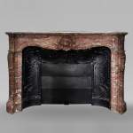 Beautiful Louis XV style fireplace in Red of the North marble 