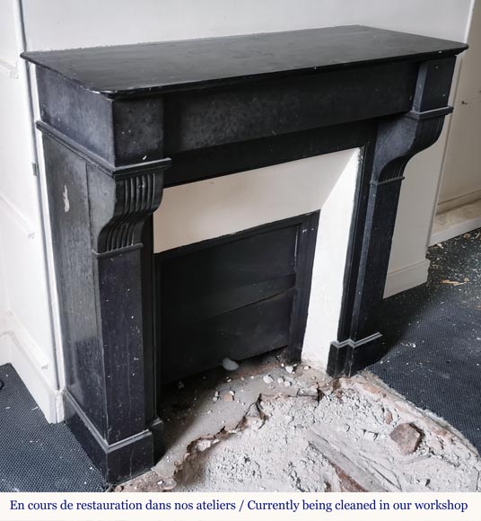 Small fireplace with modillions in Black marble-2