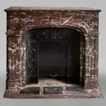 Regence style fireplace in Red of the North marble