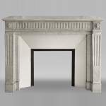 Louis XVI style mantel with flutes and roses decoration in Carrara marble
