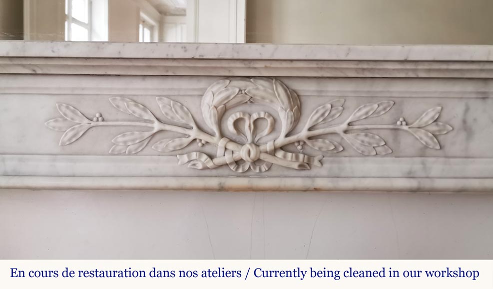 Louis XVI style fireplace in Carrara marble with a laurel crown-1