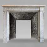 Small Louis XVI style fireplace in a very veined Carrara marble