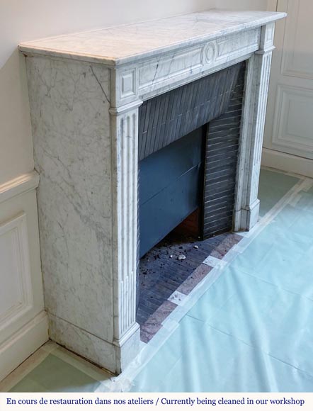 Small Louis XVI style fireplace in a very veined Carrara marble-2
