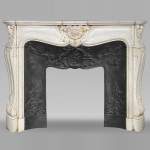 Louis XV style mantel in Carrara marble with shells