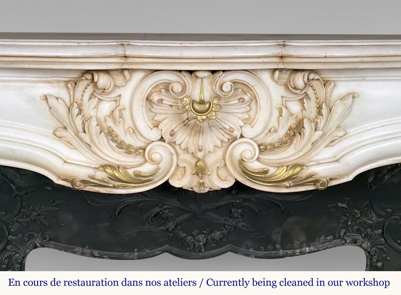 Surperb Louis XV style fireplace with a rich sculpted decoration risen by gold painting in half statuary marble-1