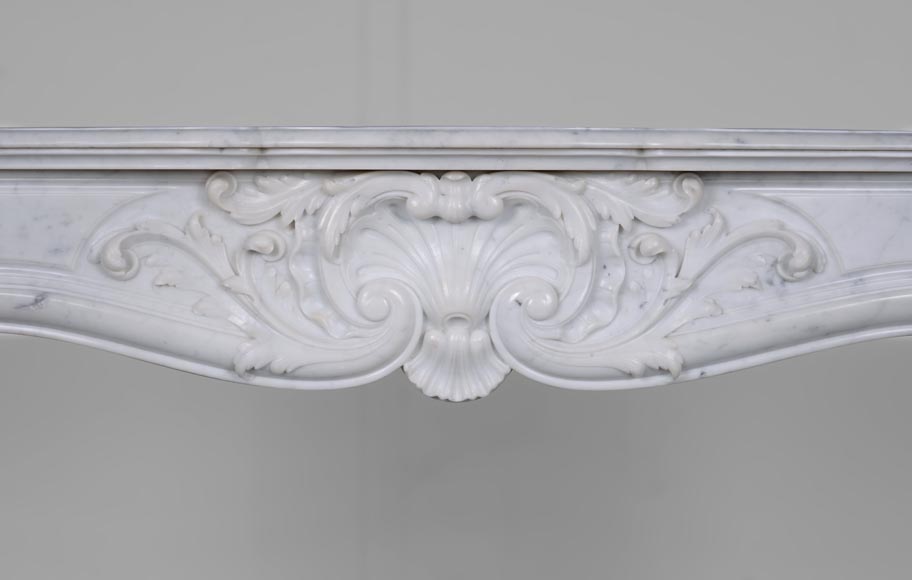 Louis XV style mantel in Carrara marble richly sculpted-1