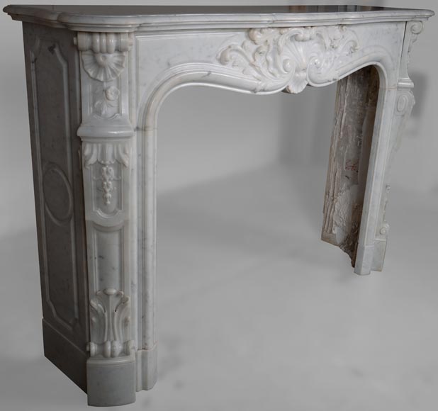 Louis XV style mantel in Carrara marble richly sculpted-5