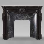 Louis XV style three shell mantel in fine black marble