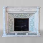 Louis XVI style fireplace with half columns and laurel crown