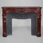 Beautiful Griotte Red marble mantel with a cabochon in an ancanthus leaves surround
