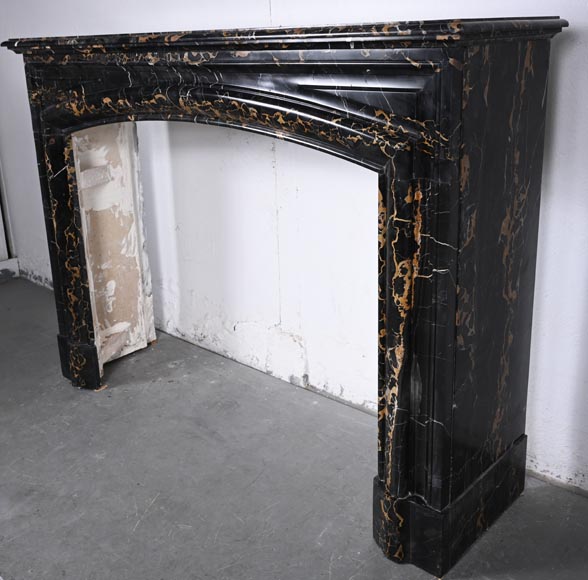 Louis XIV style fireplace in Portoro marble, with a molding and rounded frieze-5
