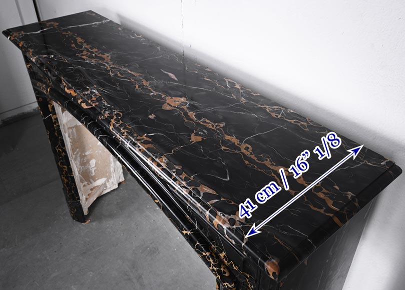 Louis XIV style fireplace in Portoro marble, with a molding and rounded frieze-8