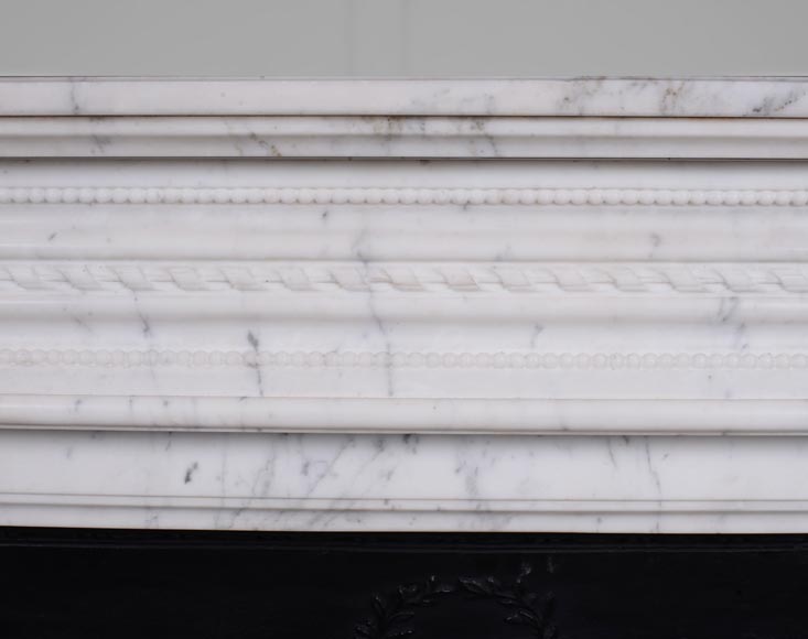 Louis XVI style mantel with pearls and ribbons carved in veined Carrara marble-1