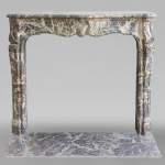 Louis XV period fireplace in Gris des Ardennes marble